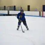 facility apex center ice arena child at learn to play hockey class
