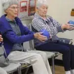 facility crc people during chair yoga class