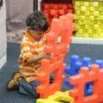 facility lake arbor preschool child playing with blocks