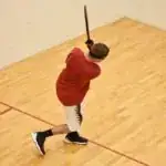 man playing racquetball at the Racquetball and Fitness Center