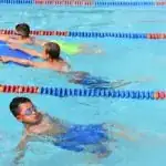 kids swimming in lap lanes at the Secrest Recreation Center outdoor pool