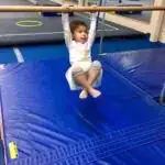 girl playing at the Simms Street Recreation Center gymnastic gym