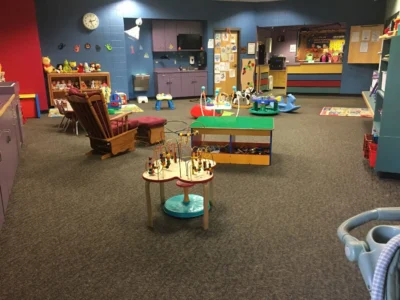 A room filled with lots of toys and furniture.