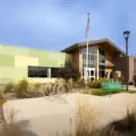 A building with a flag pole.