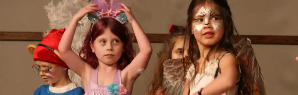 A group of children in costumes.